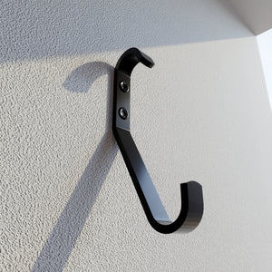 Cloth hook mounted on a wall.