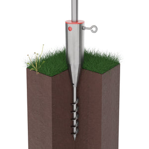 Rotary washing line ground spike driven into soil, showing installation.