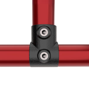 Short tee tube clamp connecting two tubes.