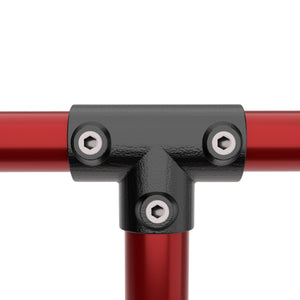 Long tee tube clamp connecting two tubular pipes.