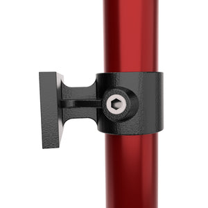 Handrail tube attached to wall mount tube clamp bracket.