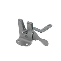 Galvanised auto gate latch catching a self-closing garden gate