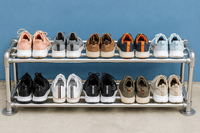 DIY shoe rack built from galvanised steel pipes and fittings