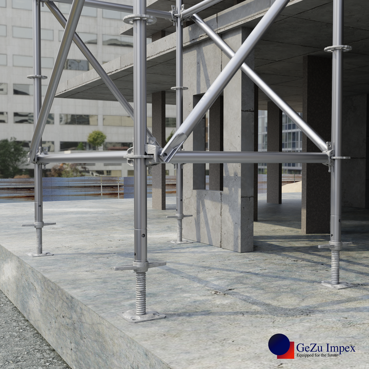 Steel scaffolding structure setup with adjustable leveling scaffold screw jack providing stable support on concrete.
