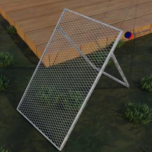 Garden sieve with metal wire mesh frame position on grass beside wooden deck.