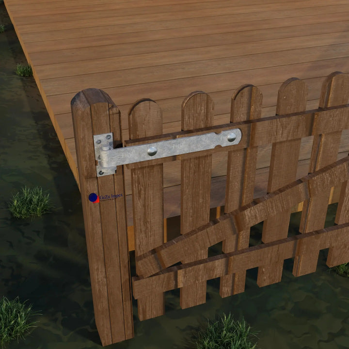 Gate hinge brace installed on a wooden gate attached to a fence post.